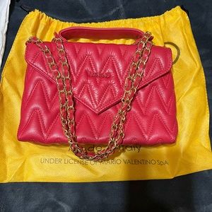 Shoulder Valentino bag made of genuine leather that is red in color and new!!